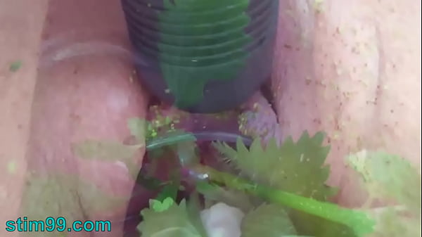 extreme female inserting nettles into cervix and rod flowers